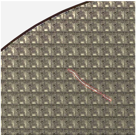 Fig. 2: Scratch on a 200mm semiconductor wafer that was made by a human. Source: Microtronic